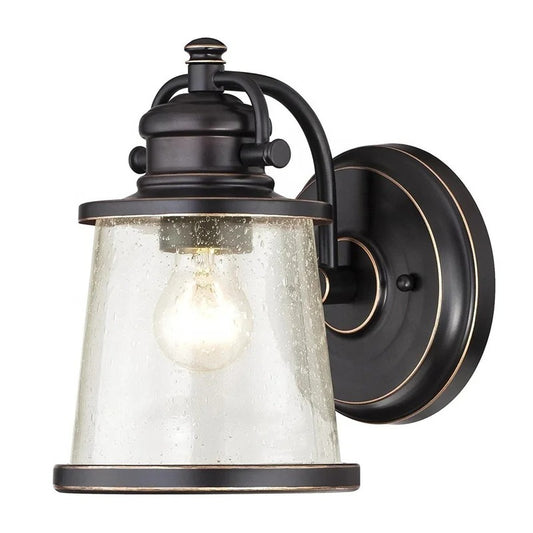 Brązowa lampa ścienna z przezroczystym kloszem z nasionkowego szkła